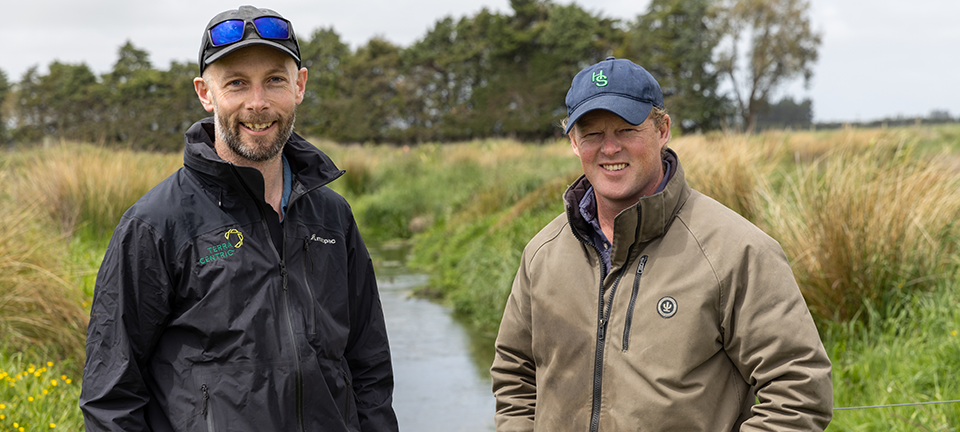 Dan Cameron and Swannanoa farmer Andrew Gilchrist at the Burgess Stream.